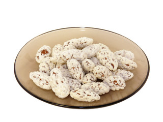 Almonds in sugar isolated on a white background
