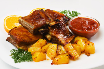 Barbecued ribs with baked potato