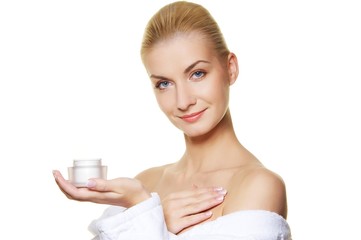 Obraz na płótnie Canvas Woman applying moisturizer cream on her body