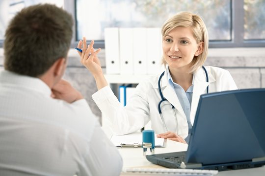 Doctor discussing diagnosis with patient