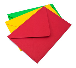 Three envelopes on white
