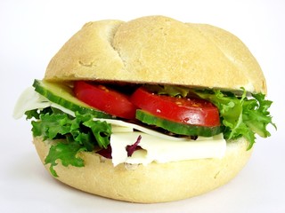 A cheese salad bread roll with tomato cucumber & lettuce