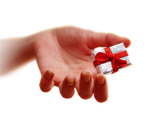 Hand and gift. Emphasis on gift