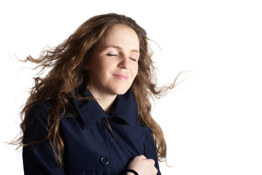 Redhead Woman In Blue Raincoat