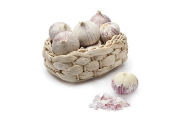 Basket with whole single clove garlic