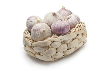 Basket with whole single clove garlic