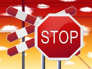 stop sign at railway crossing and red sky
