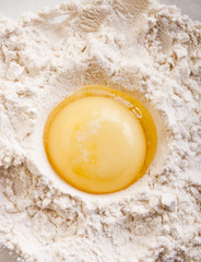 spread flour with egg