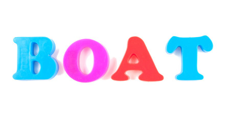 boat written in fridge magnets isolated on white