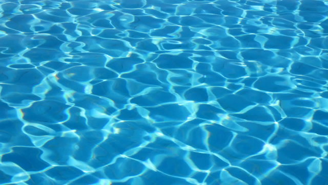 swimming pool with ripple turquoise water background