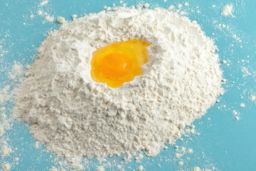 Broken egg on flour, means for making bread