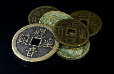 Chinese coins on black