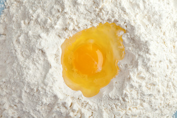 Broken egg on flour, means for making bread