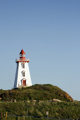 Fototapeta na wymiar Lighthouse on a Hill