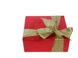 Red rectangular gift box with a golden bow over white