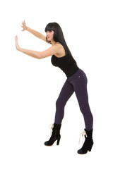 Fototapeta premium Beautiful woman pushing something
