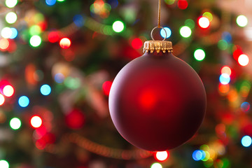 christmas ball and blurred christmas lights