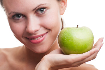 young beautiful woman holds an apple