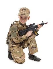Fototapeta premium Young soldier with rifle