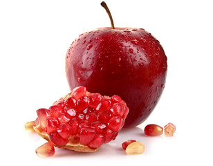 apple and pomegranate isolated on white