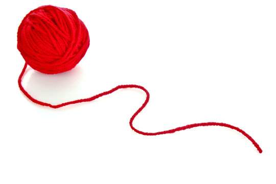 Red ball of woollen red thread isolated on white