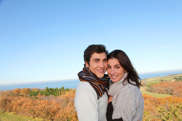 Portrait of happy couple in fall season