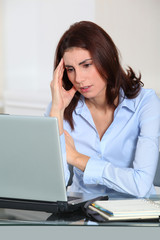 Portrait of unhappy businesswoman