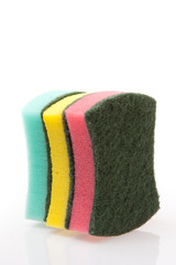 A stack of cleaning sponges on a white background