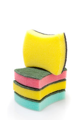 A stack of cleaning sponges on a white background