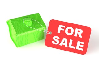 A green house with a price tag