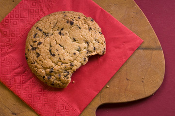 Chocolate cookie over on a cutting board
