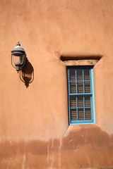 Adobe Building with Window and Light Fixture