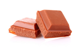 chocolate pieces on white background