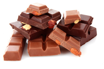 Many chocolate   pieces on white background