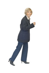 Senior business woman running