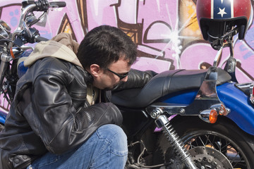 Fototapeta na wymiar A Motorcycle Rider and his Custom Bike