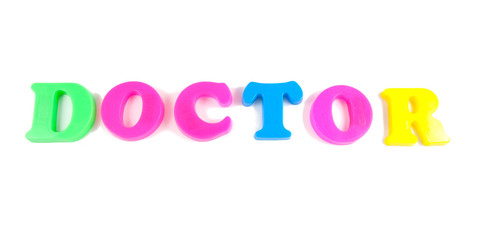doctor written in fridge magnets on white background