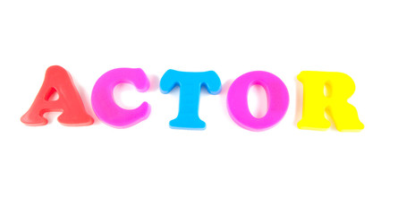 actor written in fridge magnets on white background