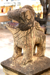 Fototapeta na wymiar Lion Statue At The Old Temple Of Kantarawichai