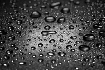 Water droplets , dramatic lighting , shallow depth of field