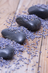 Fototapeta na wymiar Luxury with lavender on blak stone