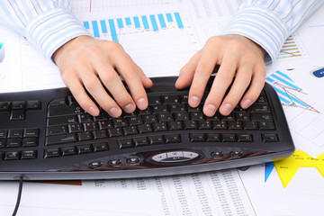 Businessman at office working at his workplace.