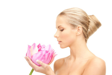 Obraz na płótnie Canvas beautiful woman with lotus flower