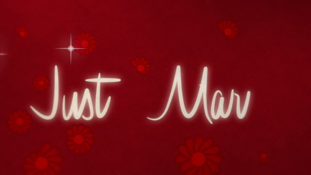 Drawing text JUST MARRIED on red paper