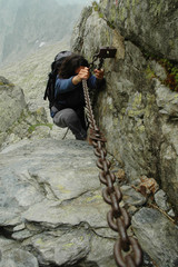 A climber girl who arrives at the summit