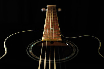 Obraz na płótnie Canvas Black acoustic guitar