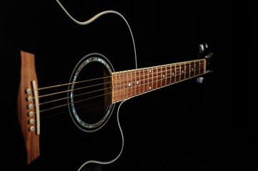 Fototapeta na wymiar Black acoustic guitar