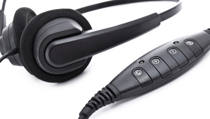 Headphones and control panel isolated on white