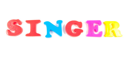 singer written in fridge magnets on white background