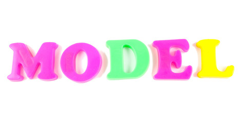 model written in fridge magnets on white background